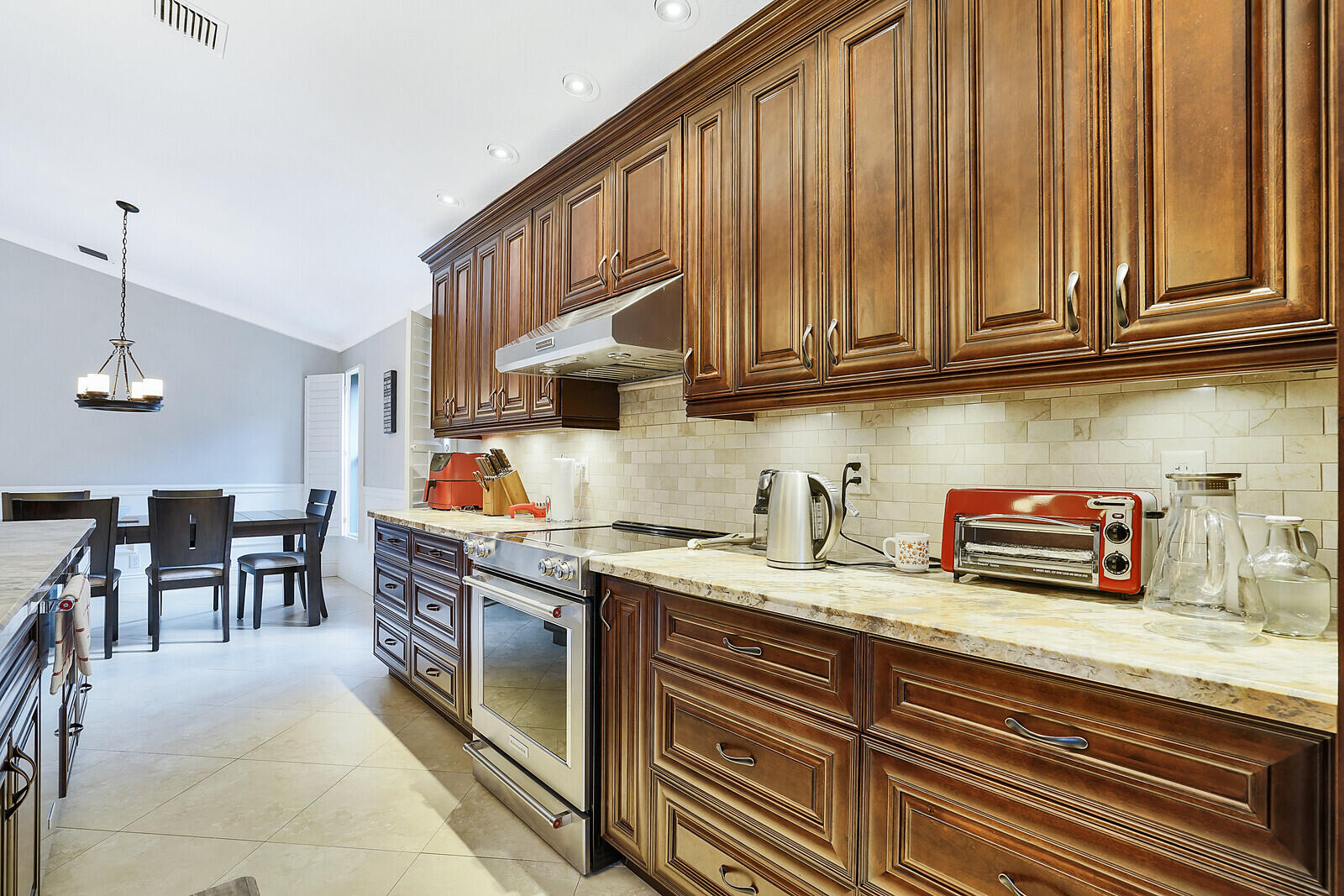 2208 Soundings Court Greenacres, FL 33413 - Photo 14 of 32 Wood Cabinets