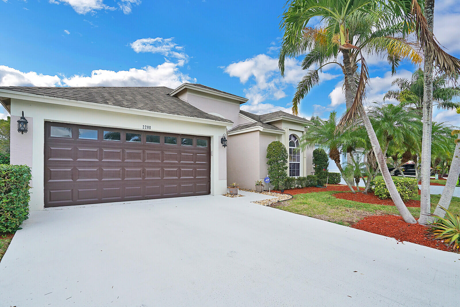 2208 Soundings Court Greenacres, FL 33413 - Photo 2 of 32 2 Car Garage
