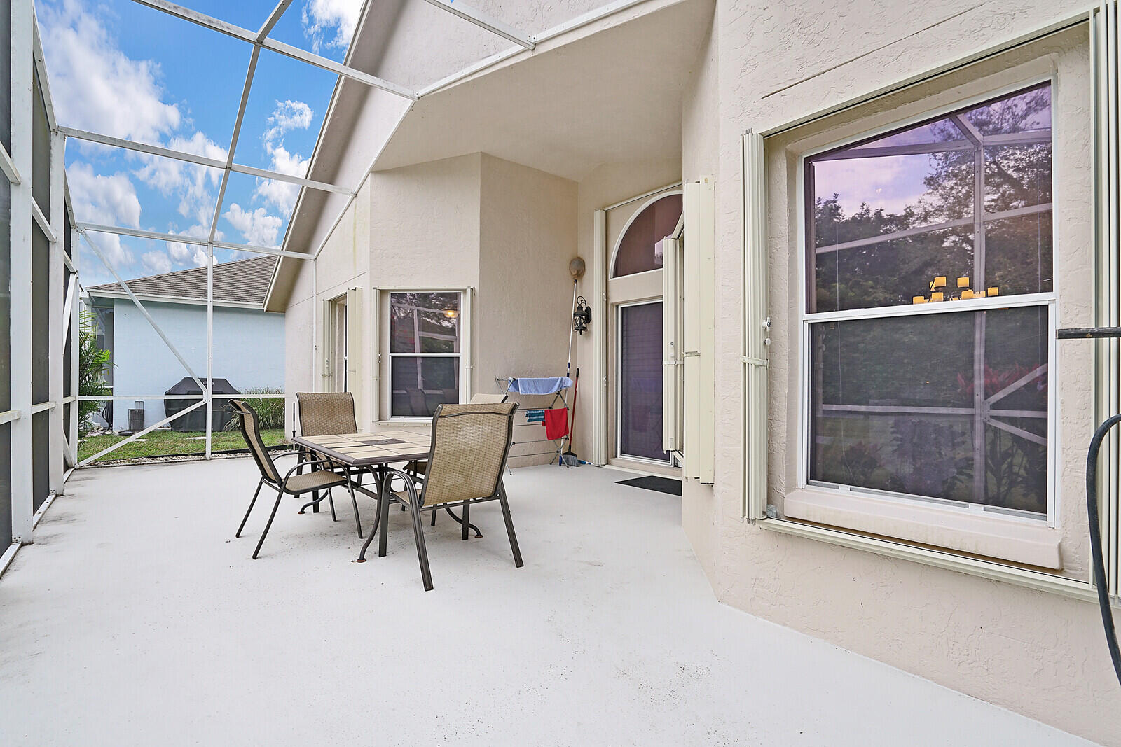 2208 Soundings Court Greenacres, FL 33413 - Photo 29 of 32 Screenedin Patio
