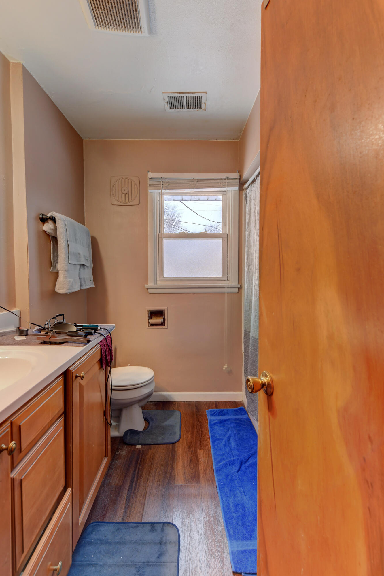 902 North Wood Street Griffith, IN 46319 - Photo 16 of 17 a room with a wooden floor and a sink