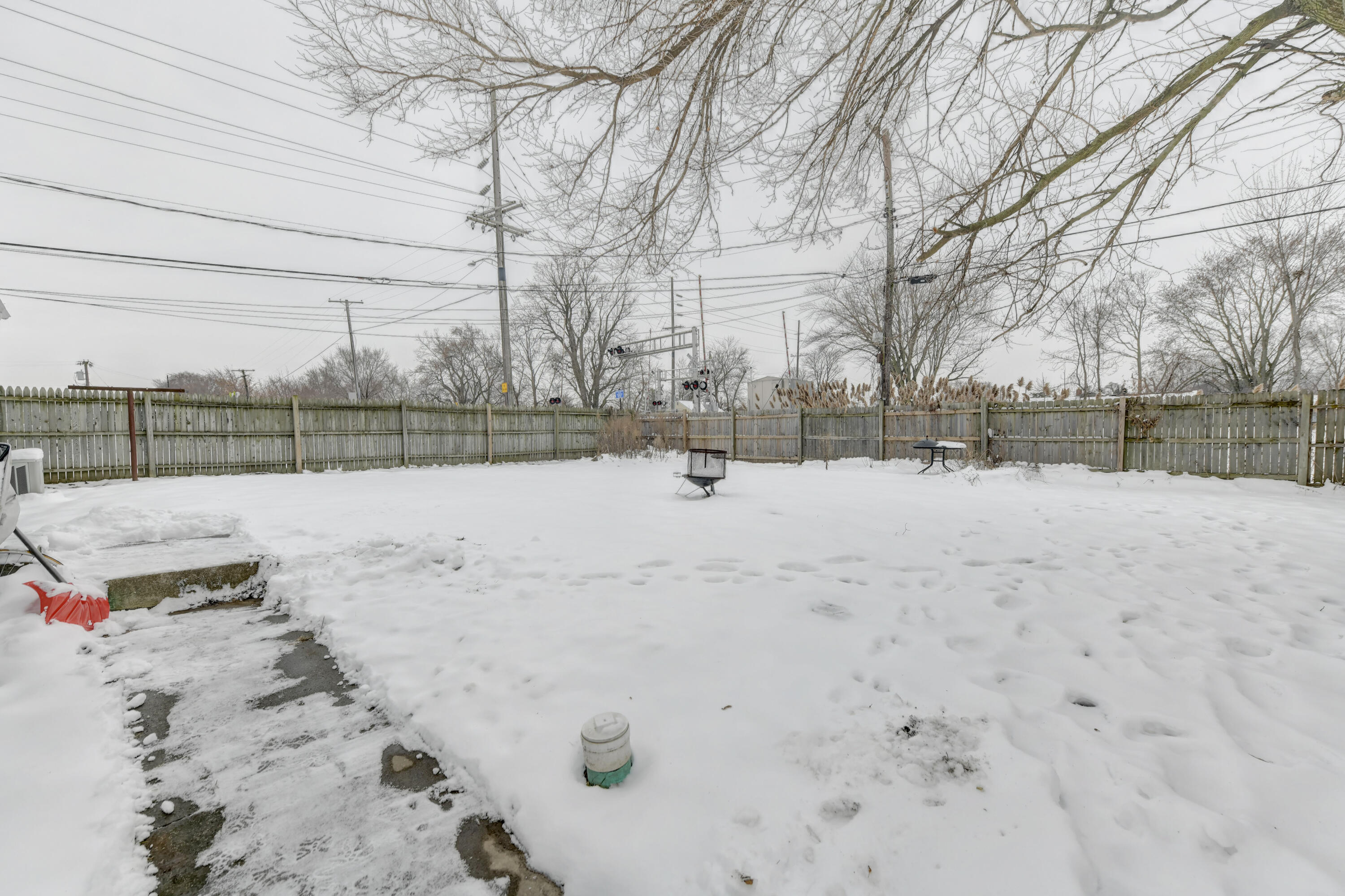 902 North Wood Street Griffith, IN 46319 - Photo 3 of 17 a view of snow on the road