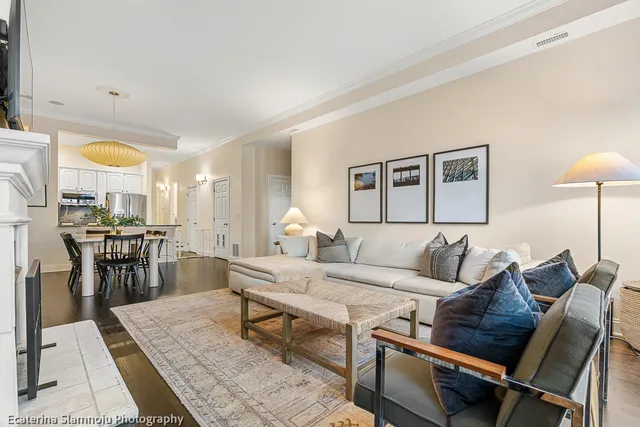 a living room with furniture and a table