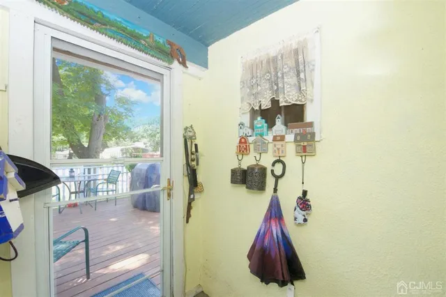 a living room with furniture and a table