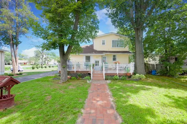 a bathroom with a sink a toilet and a vanity