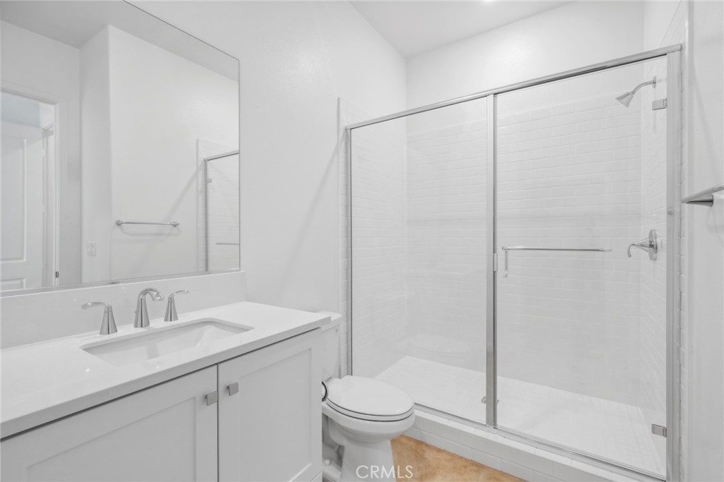 111 Baluster Irvine, CA 92618 - Photo 24 of 30 a bathroom with a sink toilet and shower
