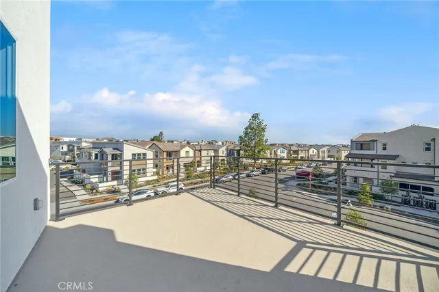 a view of a balcony with city view