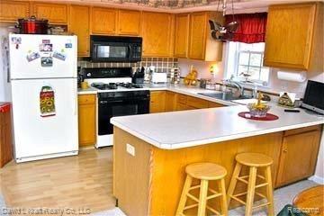 4145 Port Austin Road Caseville, MI 48725 - Photo 3 of 16 4145PtAustinKitchen.jpg
