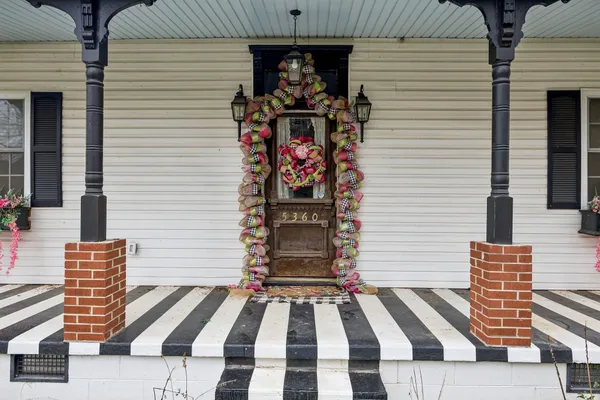 a front view of a house with entryway