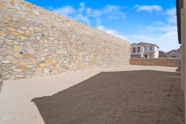 a view of ocean with a big yard