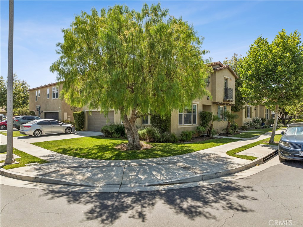 4155 Windspring Street Corona, CA 92883 - Photo 4 of 38 a view of a house with pool and sitting area