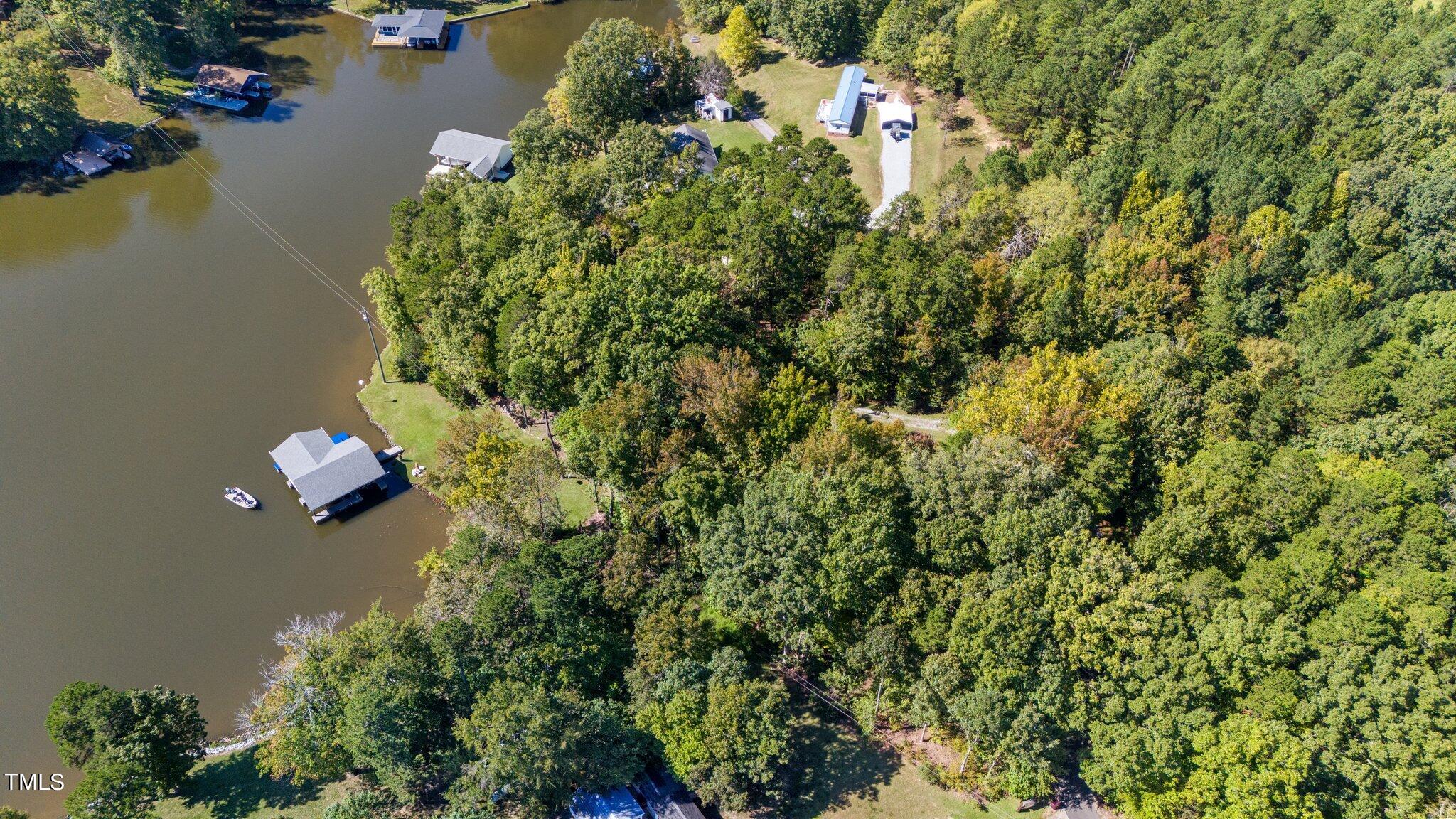 395 Velvet Road Semora, NC 27343 - Photo 18 of 22 aerial dock and lawn