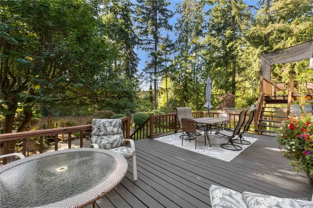 swimming pool view with a seating space