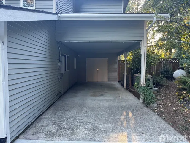 a view of a back yard of the house