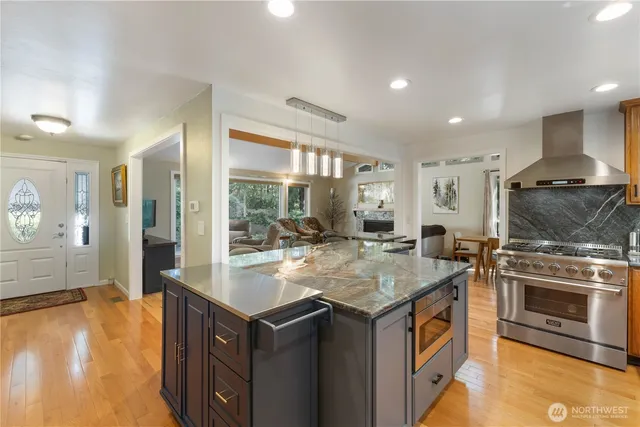a kitchen with a stove and a sink