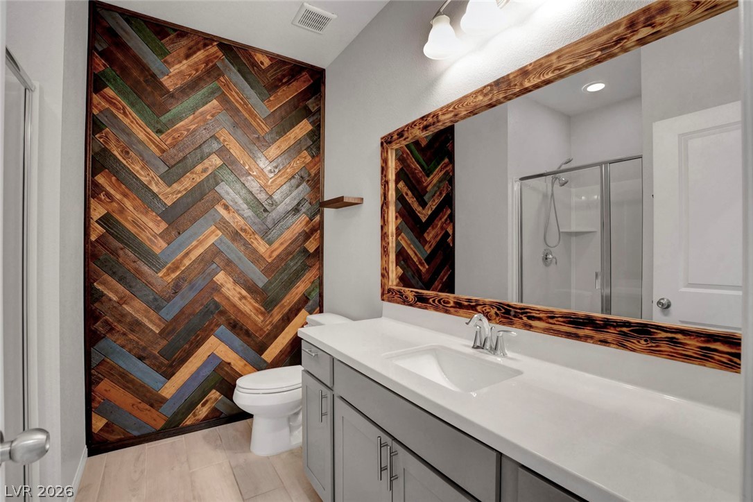 8067 Tank Loop Street Las Vegas, NV 89166 - Photo 24 of 99 Downstairs Bathroom