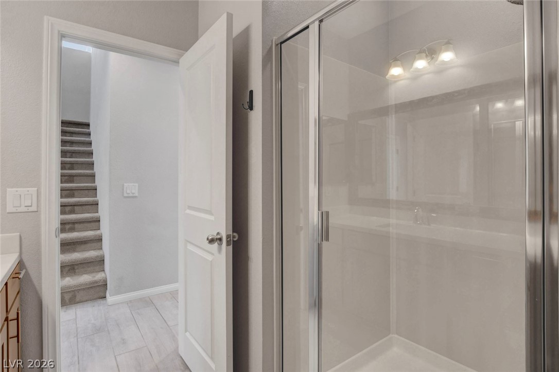 8067 Tank Loop Street Las Vegas, NV 89166 - Photo 25 of 99 Downstairs Bathroom