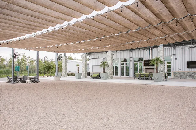 a view of road with a houses