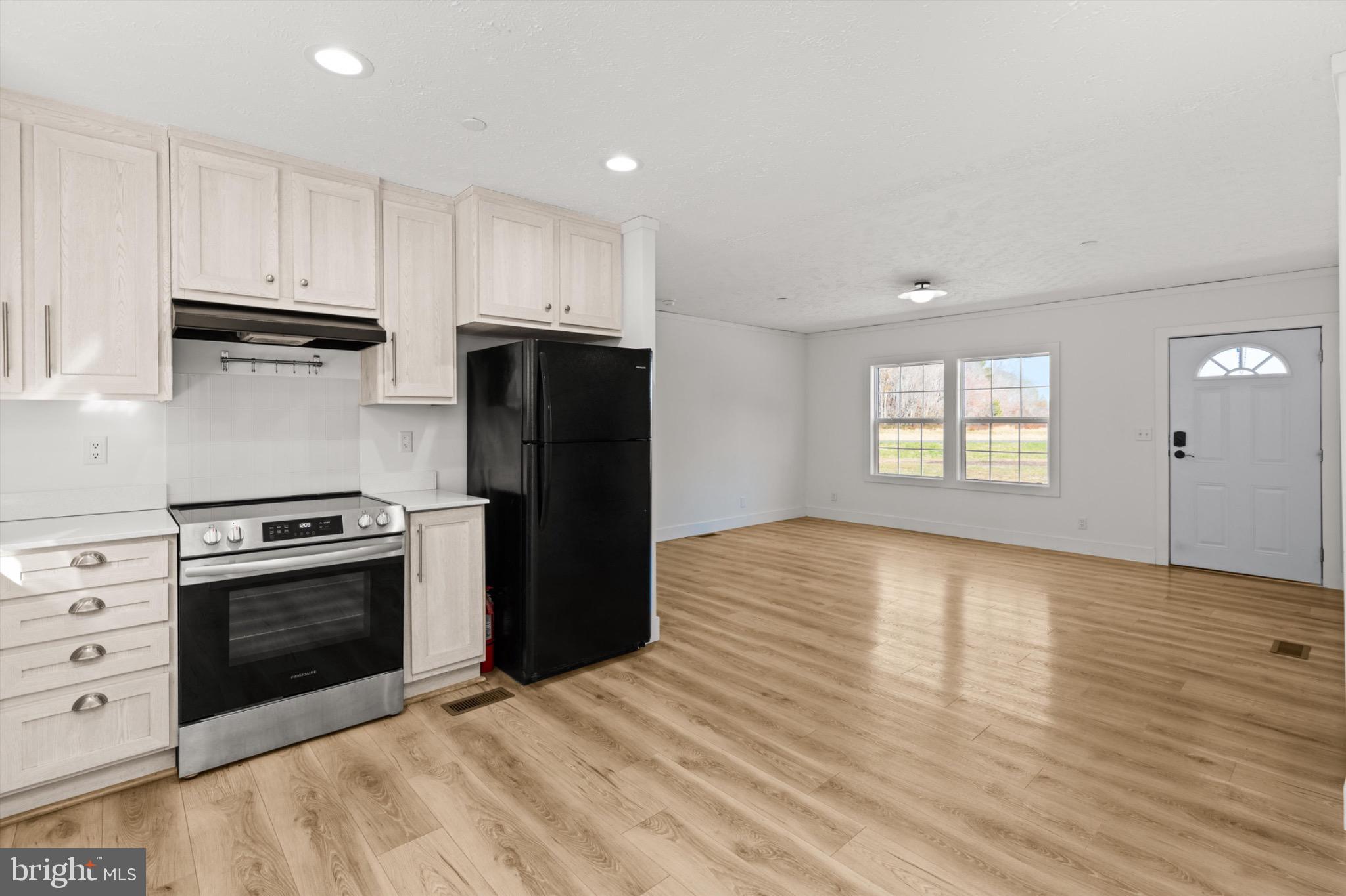 8937 Ninepin Branch Road Berlin, MD 21811 - Photo 11 of 44 Bright and airy kitchen with modern finishes.