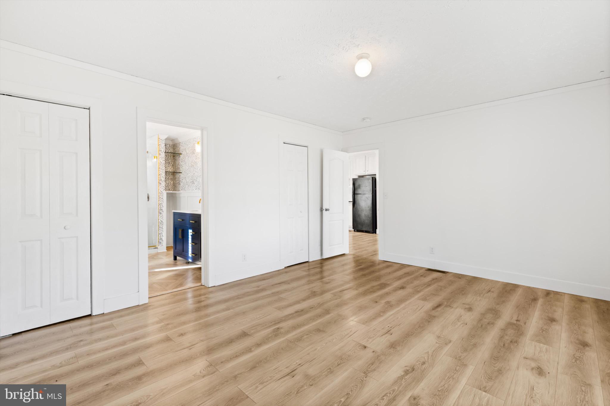 8937 Ninepin Branch Road Berlin, MD 21811 - Photo 22 of 44 Master bedroom with two walk in closets