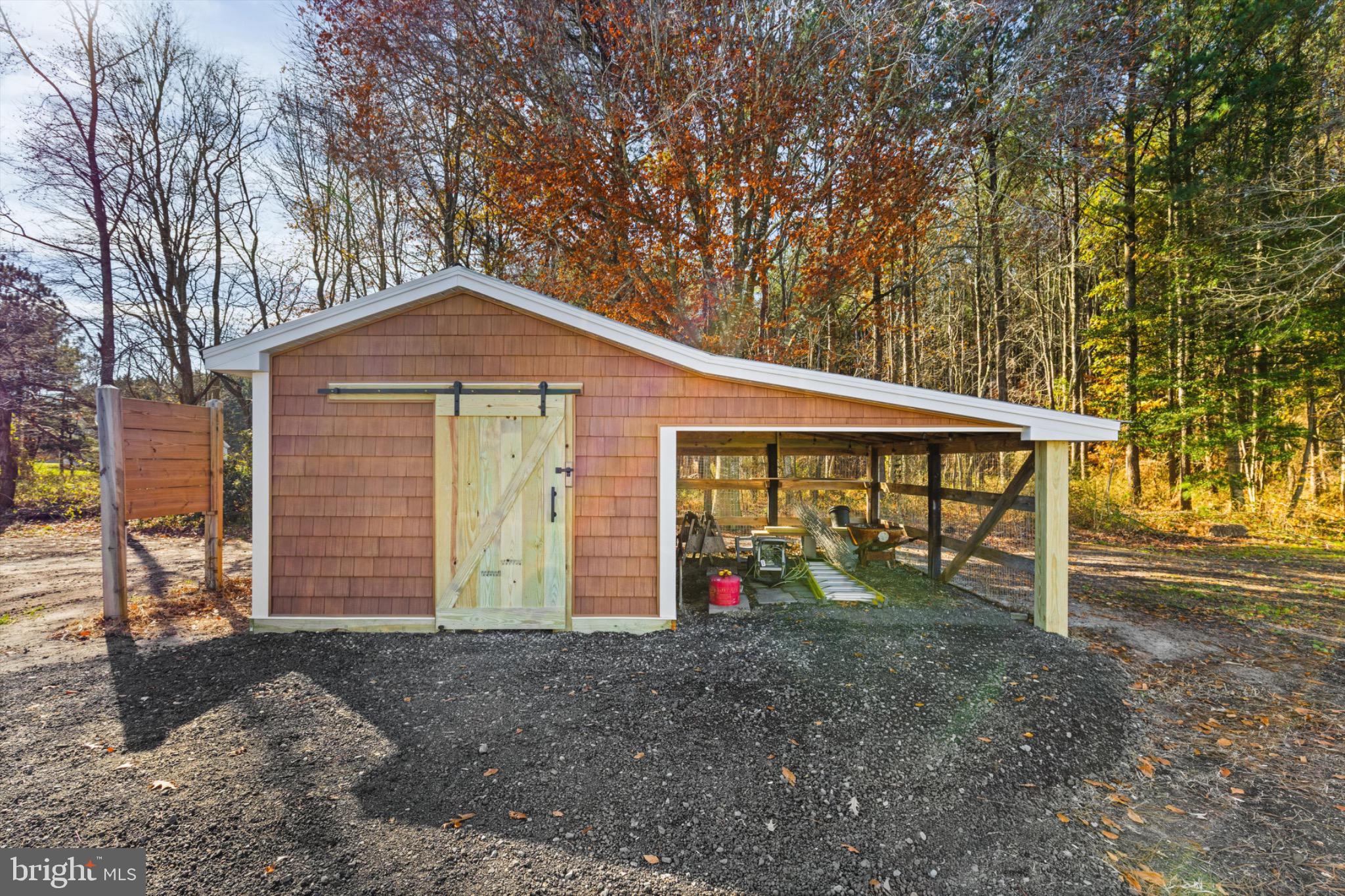 8937 Ninepin Branch Road Berlin, MD 21811 - Photo 31 of 44 Charming shed nestled in serene woods.