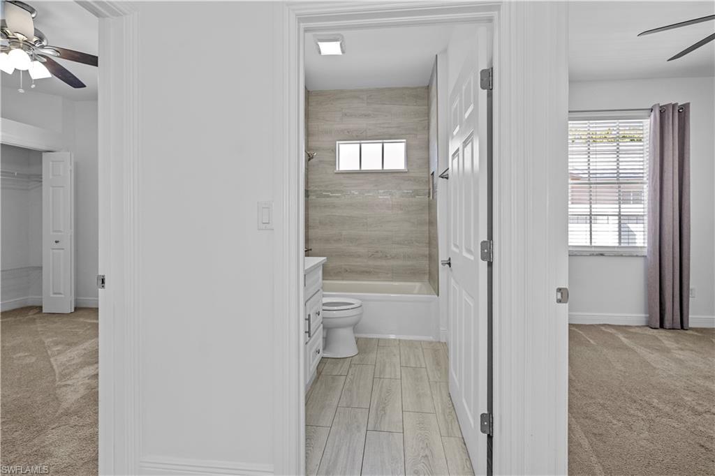 183 7th Street Naples, FL 34113 - Photo 16 of 50 a bathroom with a toilet