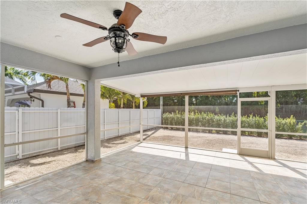 183 7th Street Naples, FL 34113 - Photo 35 of 50 a view of an empty room with a sliding door