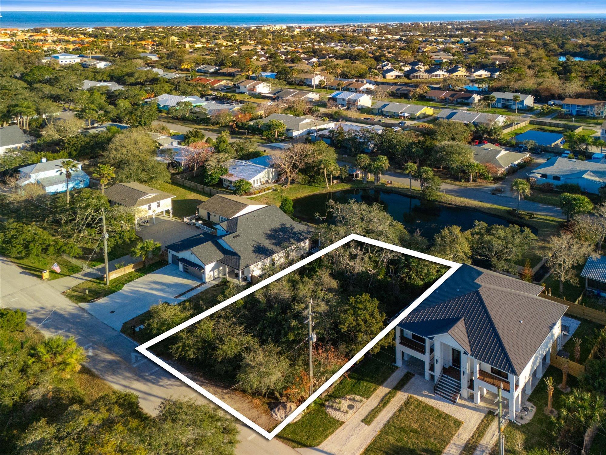 261 Dondanville Road St. Augustine, FL 32080 - Photo 11 of 18 an aerial view of house with yard