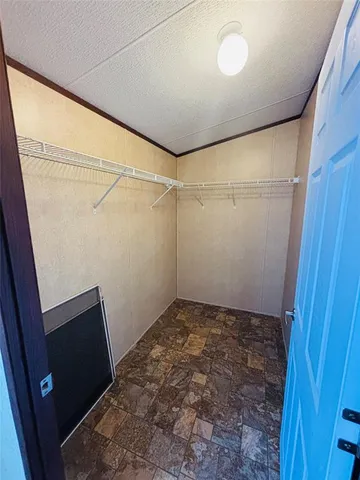 a view of a room with empty racks