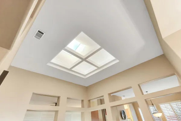 a view of a dining room with furniture window and chandelier