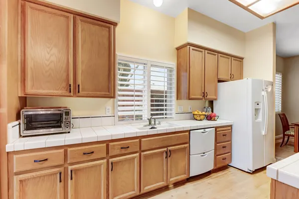 a view of living room with furniture and a flat screen tv