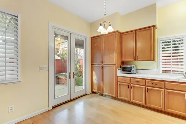 a hallway with cabinets