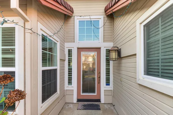 a swimming pool with outdoor seating