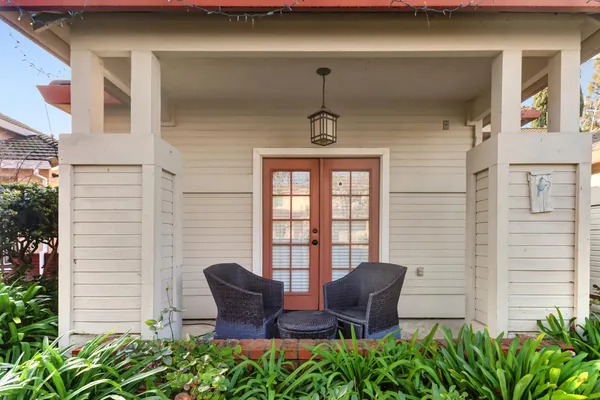 a front view of a house with garden