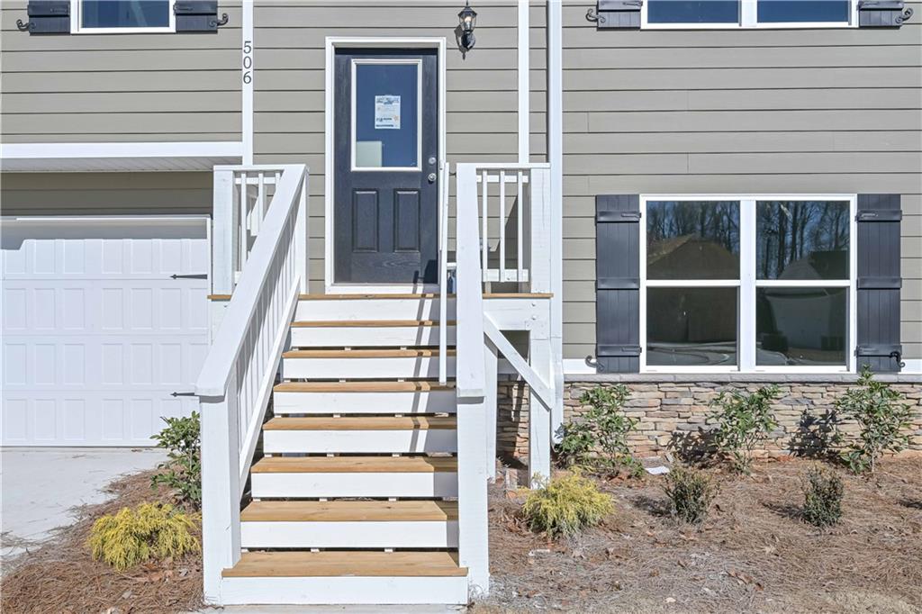 506 Charleston Place Villa Rica, GA 30180 - Photo 7 of 25 a view of a house with entryway and wooden floor