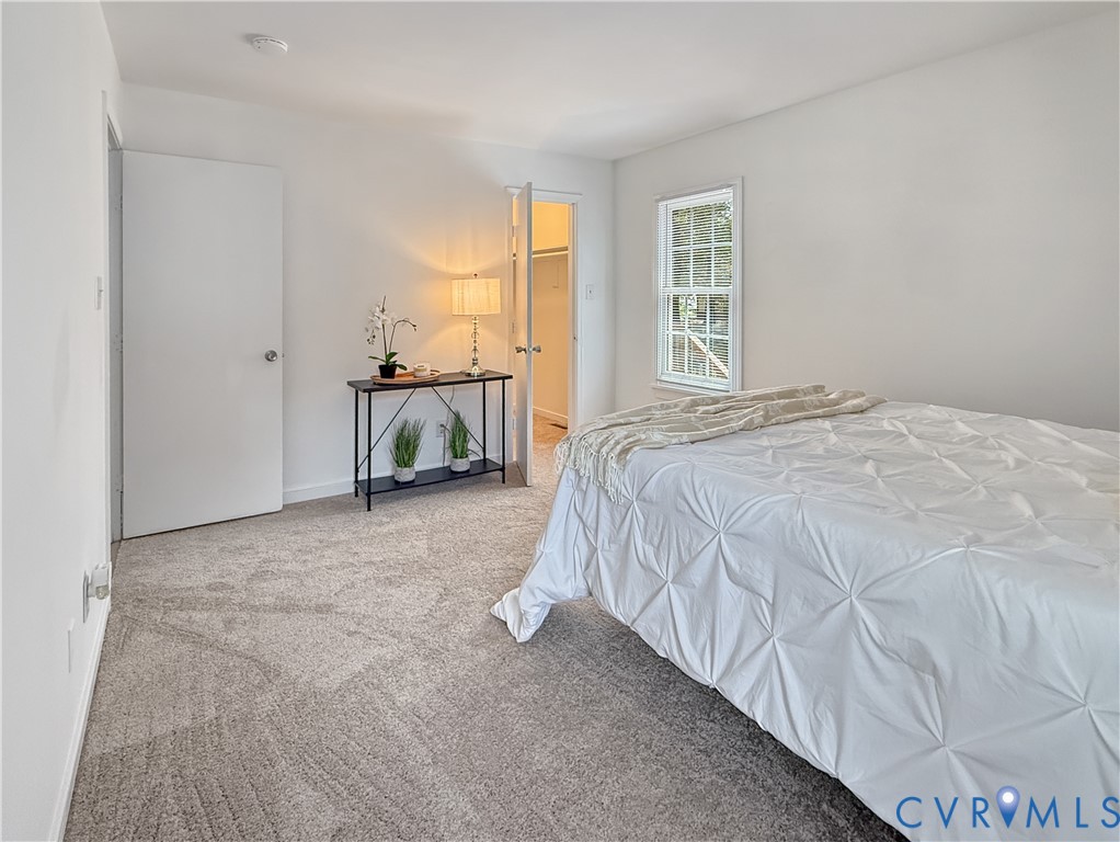 3203 Roland View Terrace Chester, VA 23831 - Photo 11 of 19 Light gray wall paint, gray carpet flooring, and a