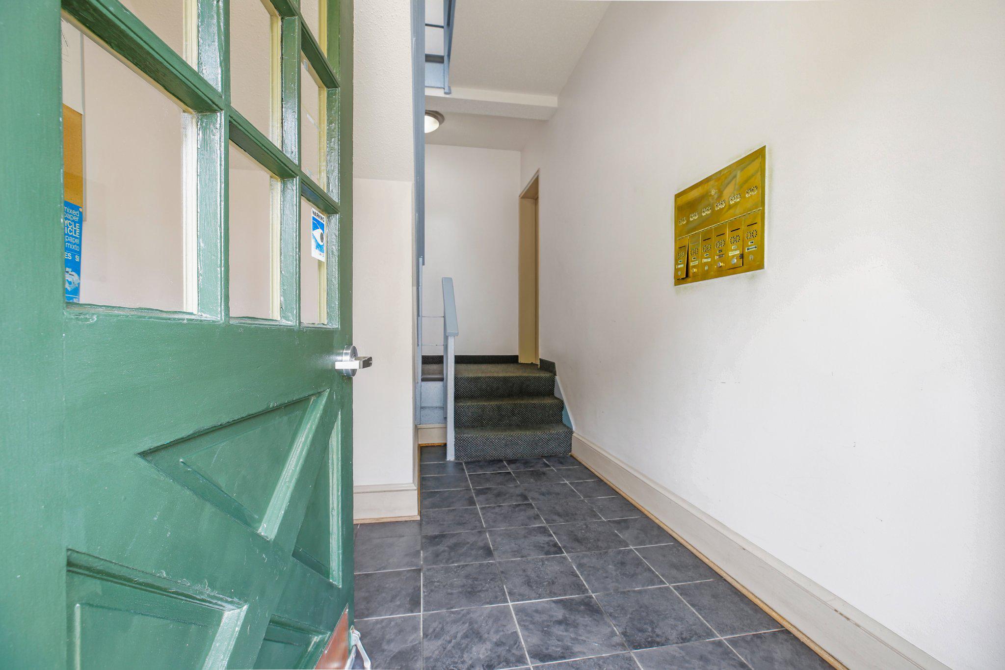 2202 Colston Drive, Unit 102 Silver Spring, MD 20910 - Photo 23 of 38 a view of a hallway with stairs