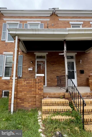 front view of a house with a large door