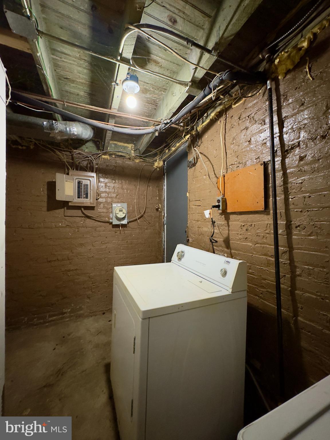 1931 Griffis Avenue Baltimore, MD 21230 - Photo 17 of 17 a utility room with dryer and washer