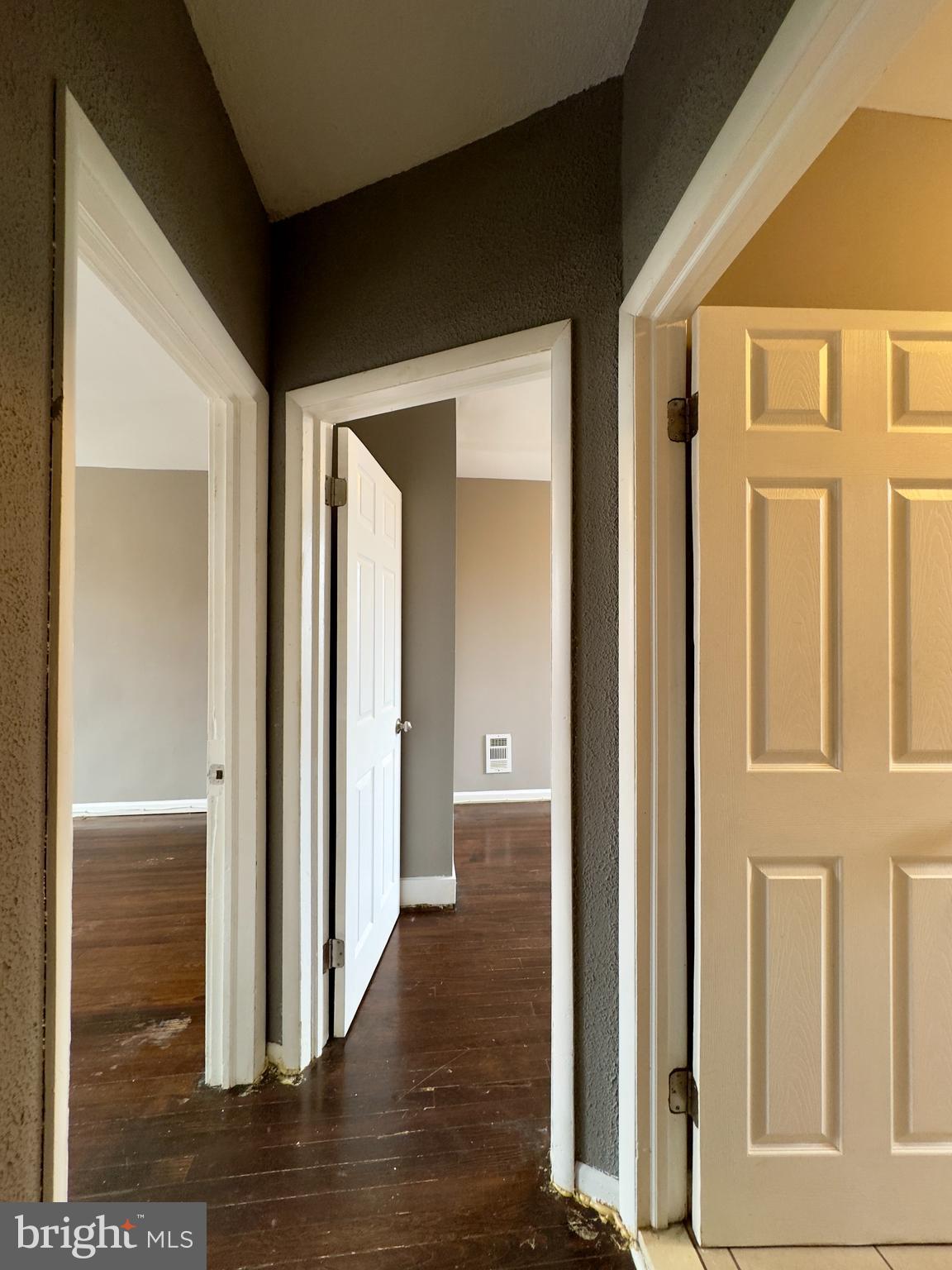 1931 Griffis Avenue Baltimore, MD 21230 - Photo 9 of 17 a view of a hallway with wooden floor and staircase