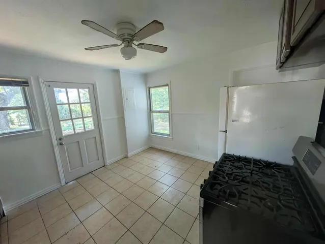 a view of balcony with wooden floor