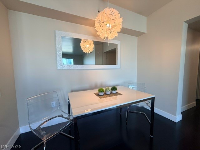2777 Paradise Road, Unit 807 Las Vegas, NV 89109 - Photo 31 of 61 A well-appointed dining space offers sleek flooring and a contemporary light fixture.