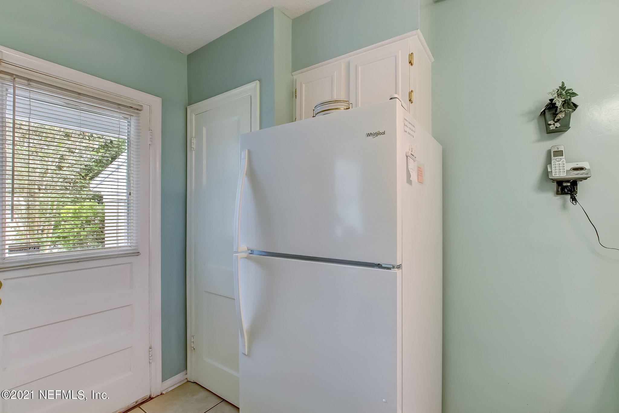 5530 Duke Road Jacksonville, FL 32207 - Photo 18 of 33 a white refrigerator freezer sitting inside of a kitchen