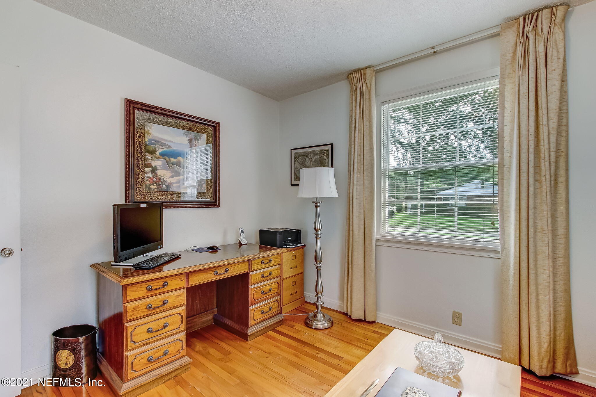 5530 Duke Road Jacksonville, FL 32207 - Photo 20 of 33 a view of a workspace with furniture and a window