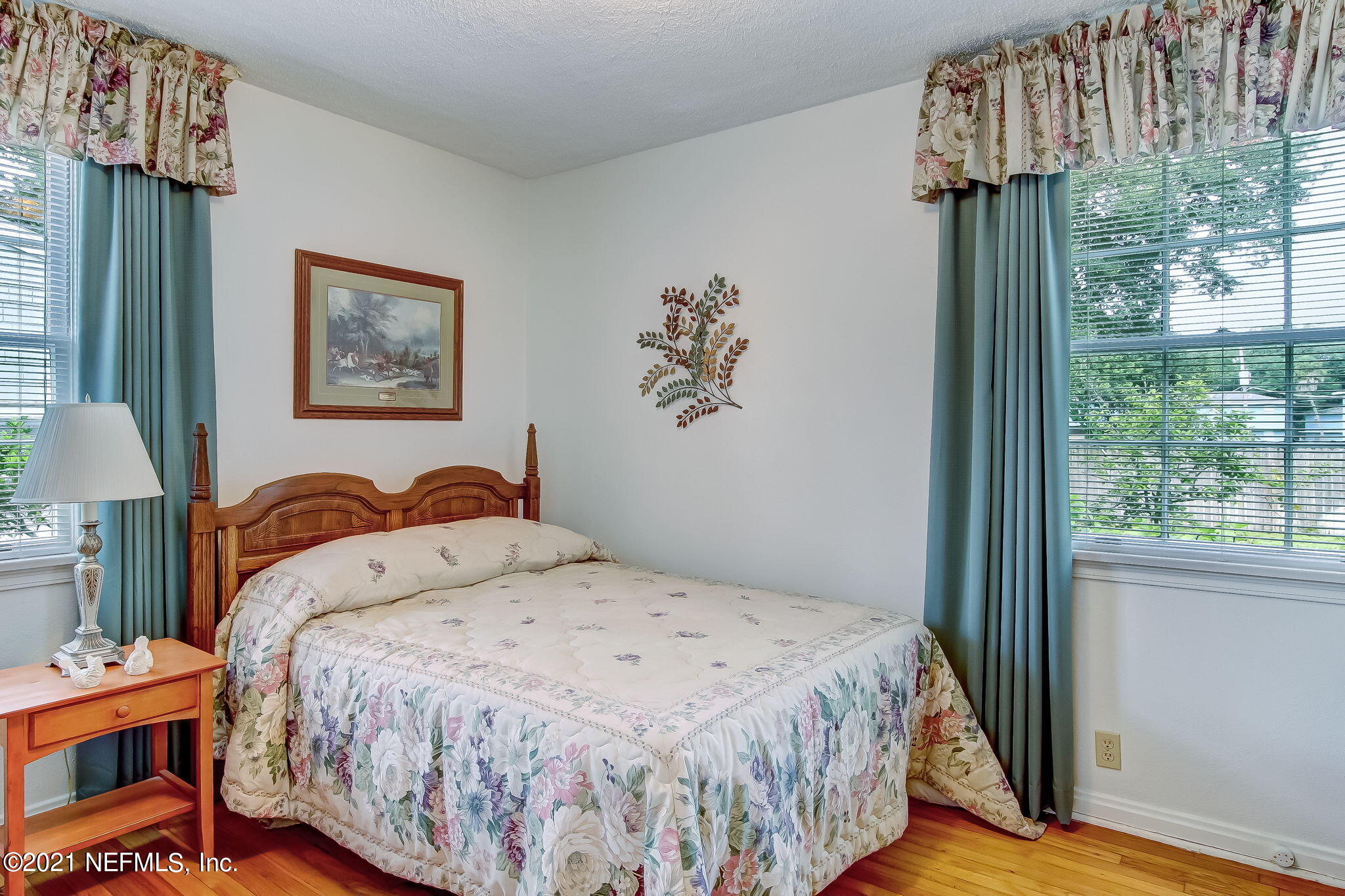 5530 Duke Road Jacksonville, FL 32207 - Photo 22 of 33 a bedroom with a bed and a window