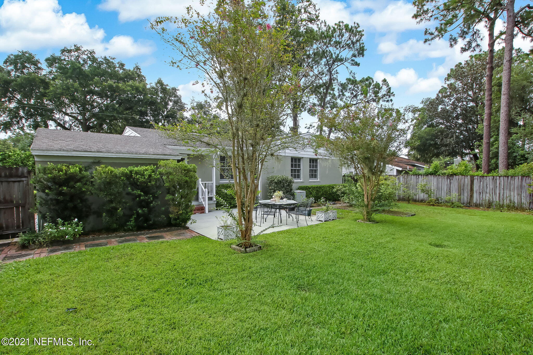 5530 Duke Road Jacksonville, FL 32207 - Photo 29 of 33 a view of a house with backyard and a tree