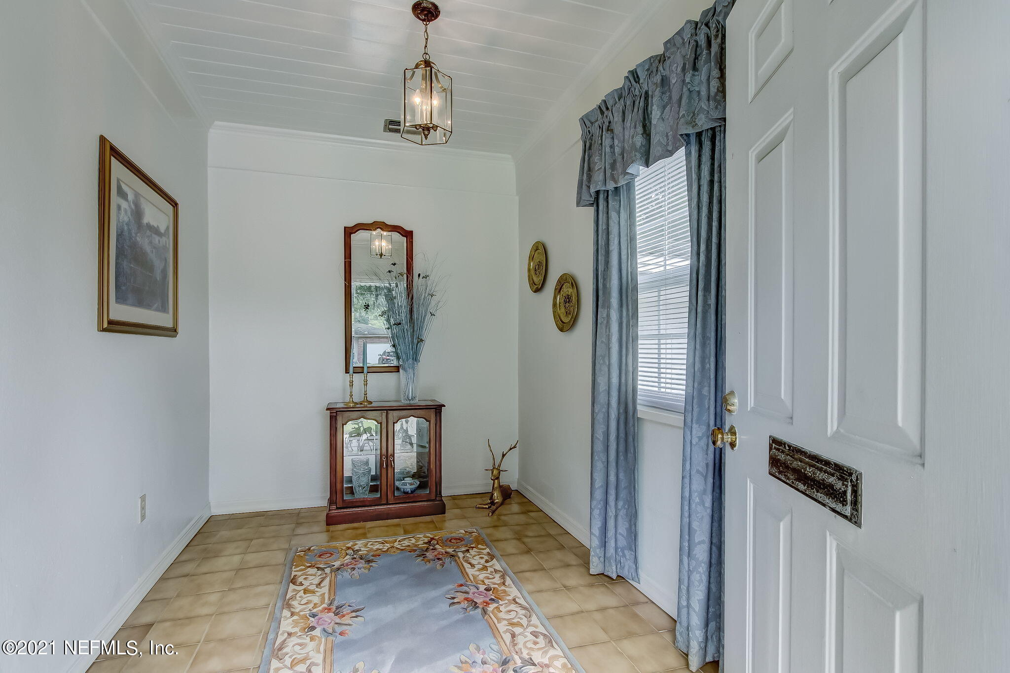 5530 Duke Road Jacksonville, FL 32207 - Photo 7 of 33 a view of an entryway with wooden floor