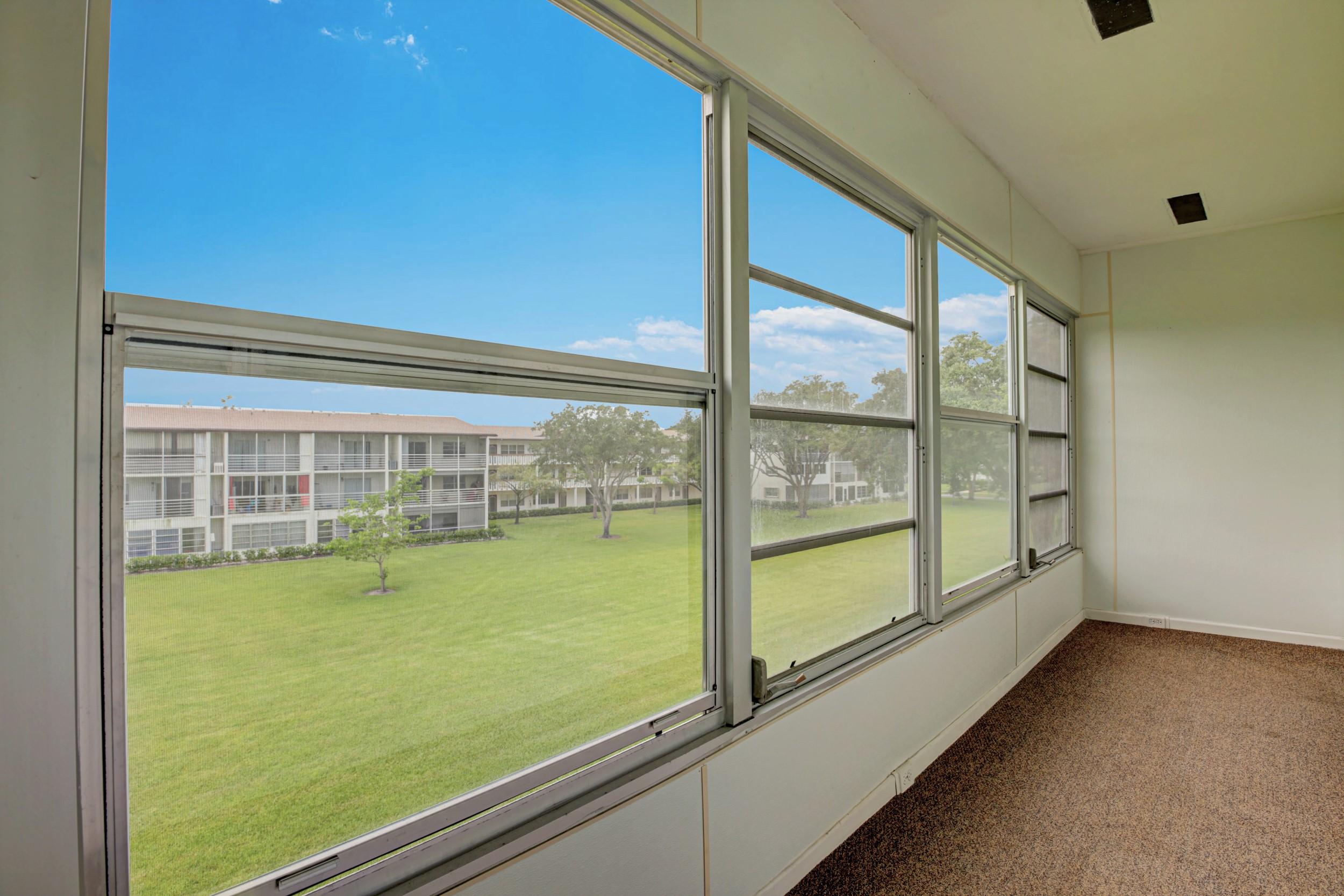 155 Mansfield East, Unit D Boca Raton, FL 33434 - Photo 22 of 42 Lanai View