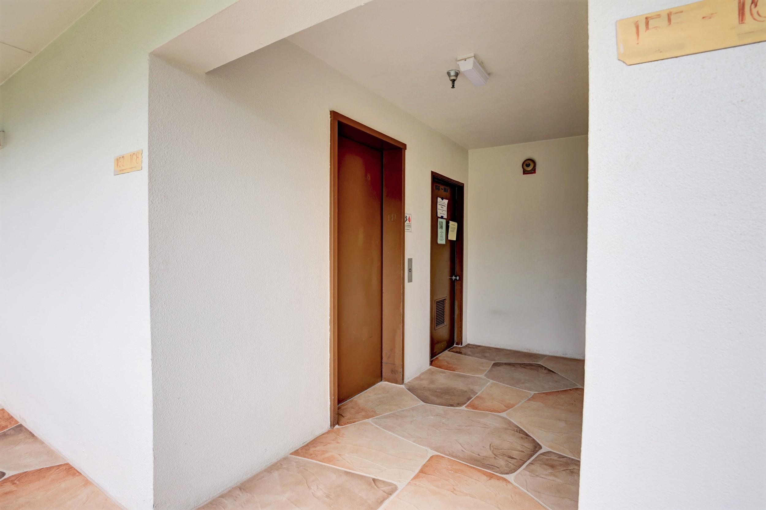 155 Mansfield East, Unit D Boca Raton, FL 33434 - Photo 24 of 42 Elevator
