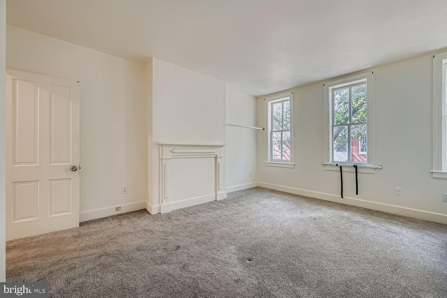 615 South Paca Street Baltimore, MD 21230 - Photo 27 of 34 an empty room with windows