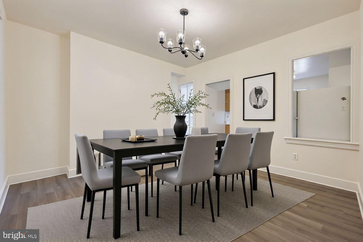 615 South Paca Street Baltimore, MD 21230 - Photo 8 of 34 a view of a dining room with furniture and chandelier